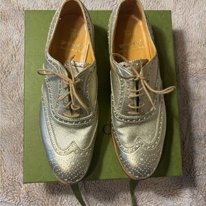 Gravati metallic gold wingtip lace up oxfords, size 6.5. NWOT, no box. Very chic